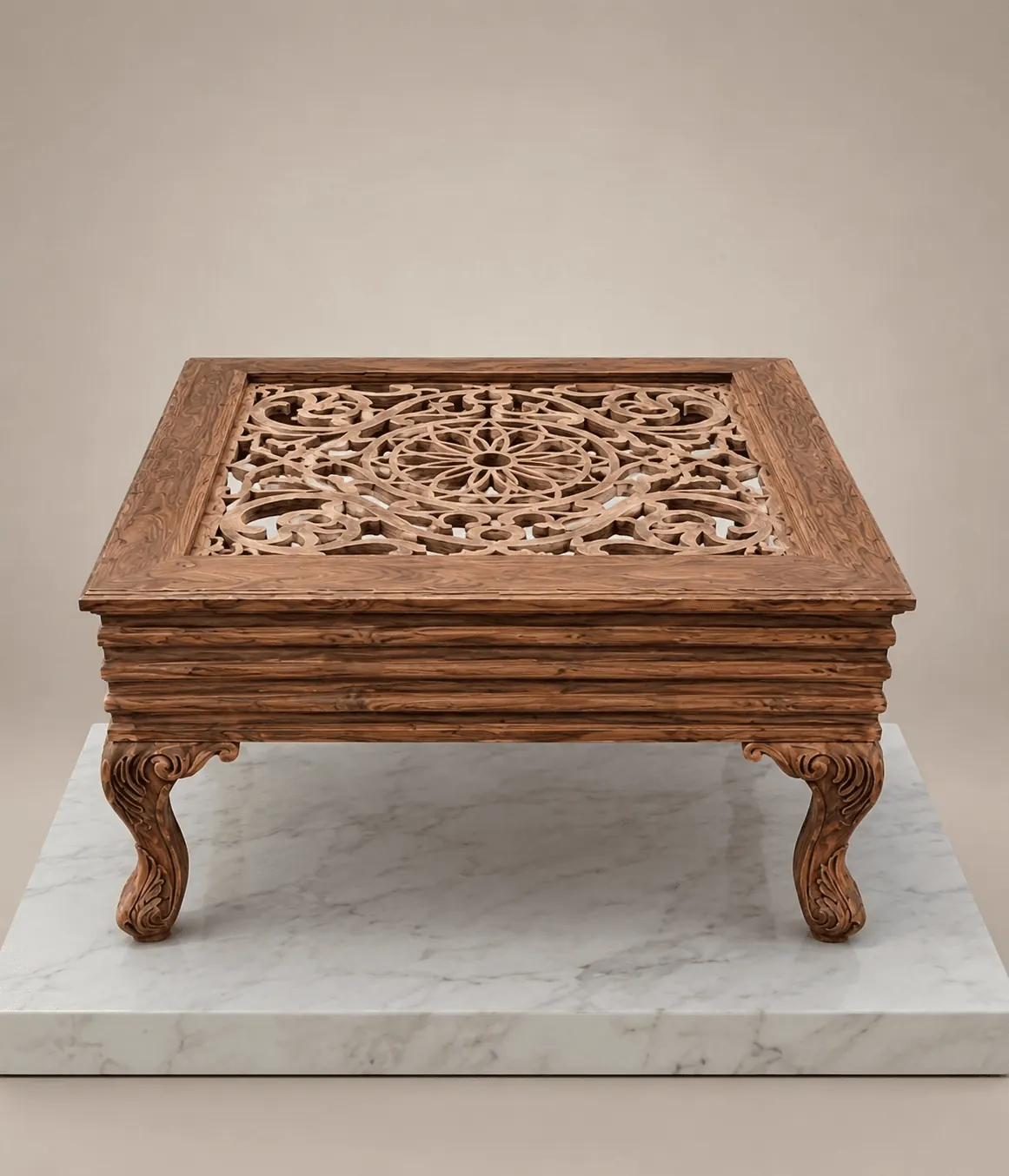 A Premium Sheesham Coffee Table with intricate lattice carvings on the top and ornate cabriole legs, displayed on a white marble platform.