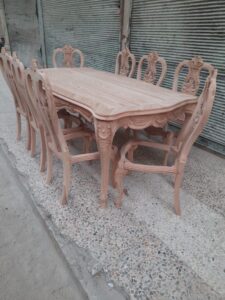 hand carved dining table and chairs