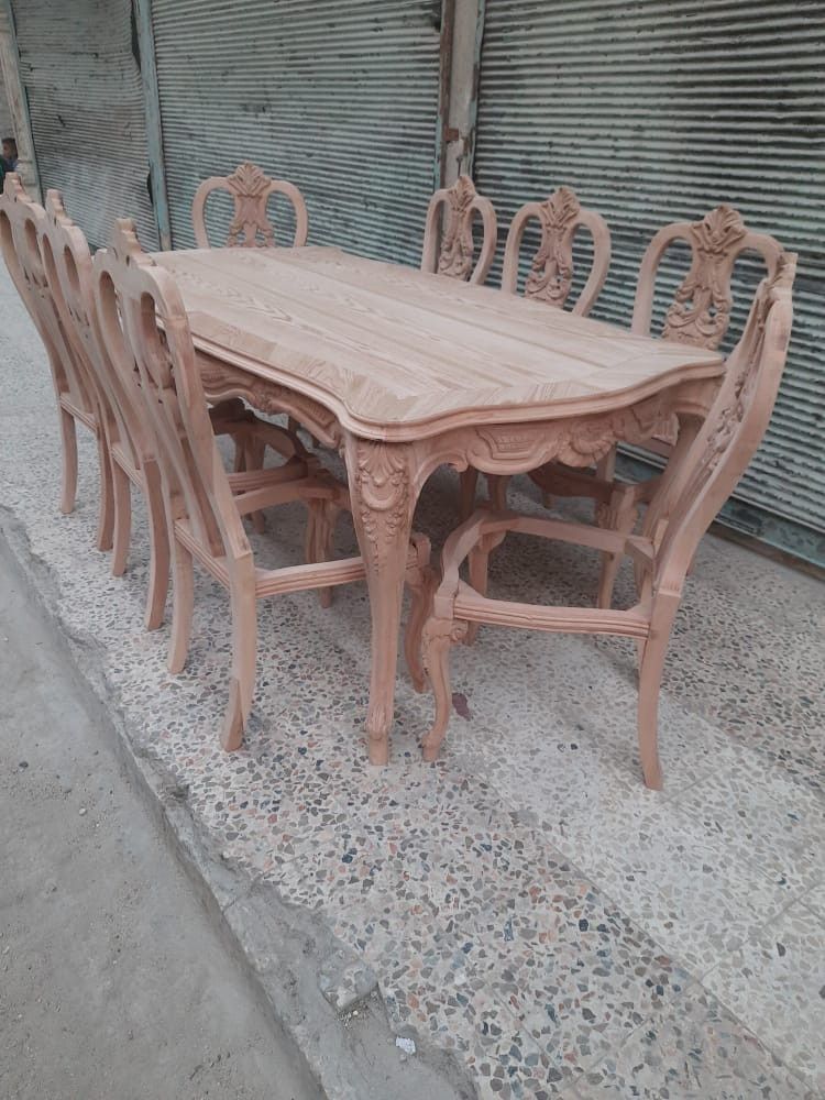 hand carved dining table and chairs