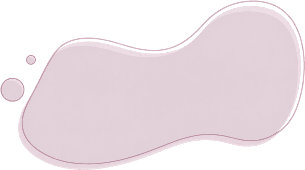 A smooth, light pink abstract blob shape with a soft outline and two smaller circular bubbles to the left, set against a plain black background.